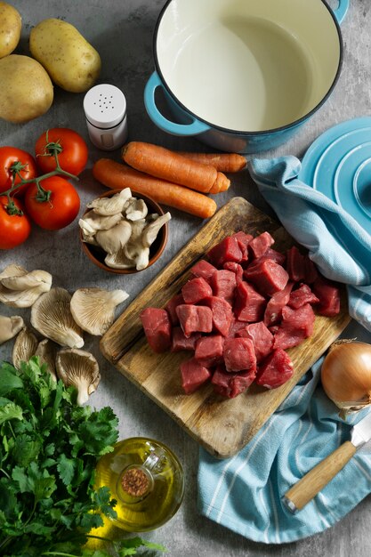 Top view raw beef and vegetables arrangement