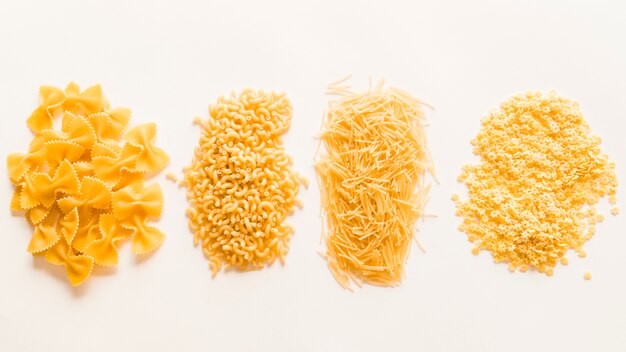 Top view raw pasta piles