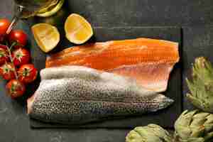 Free photo top view raw salmon still life