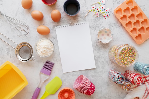 Top view on recipe book still life concept