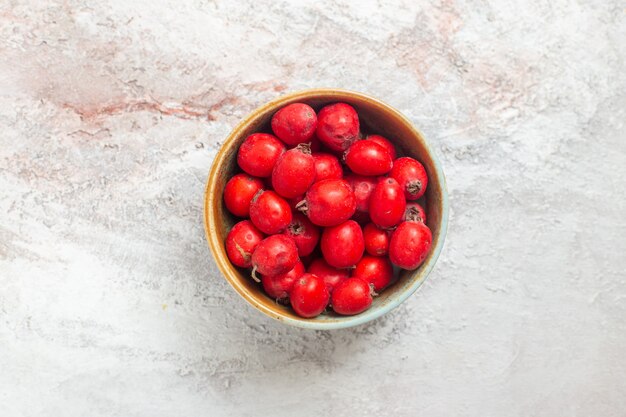 Top view red berries on white table fruit fresh taste