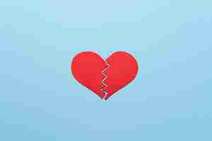 Free photo top view red broken heart on blue background