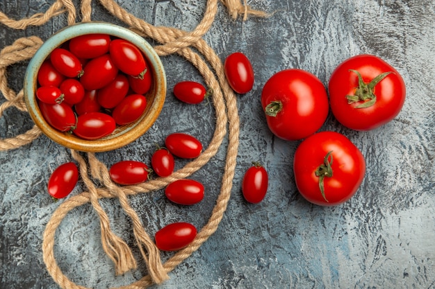 Top view red cherry tomatoes with ropes