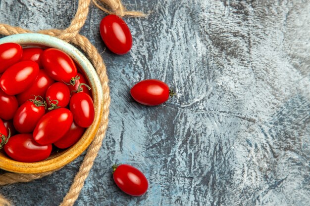 Top view red cherry tomatoes with ropes