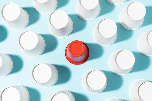 Top view red plastic cup and paper cups