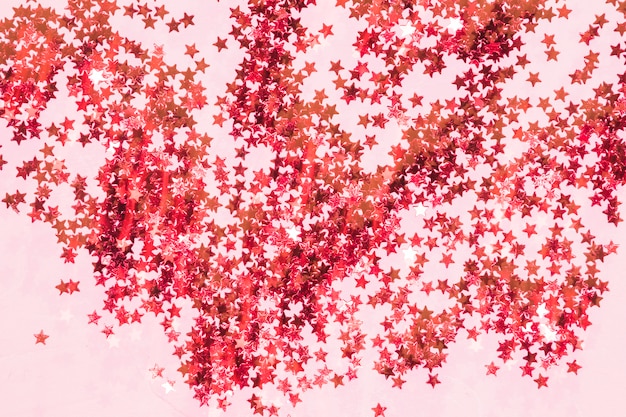 Free photo top view red sequins pile