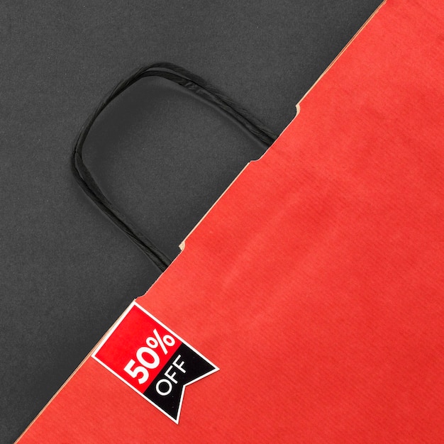 Free photo top view red shopping bag