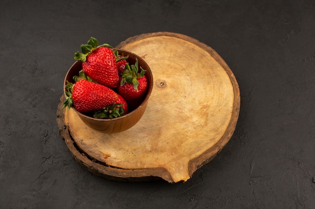 top view red strawberries ripe mellow juicy on the dark background