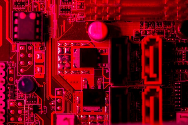 Free photo top view red themed circuit board