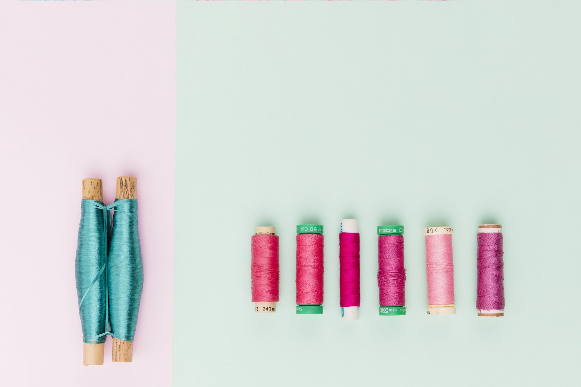 Top view reels of yarn in pastel color