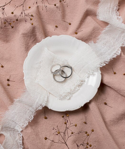 Free photo top view rings and plate arrangement