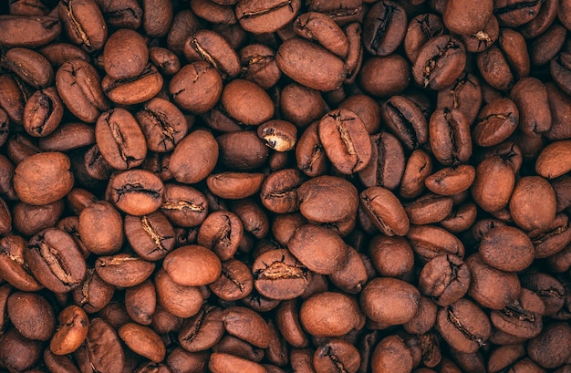 Top view of roasted coffee beans with copy space