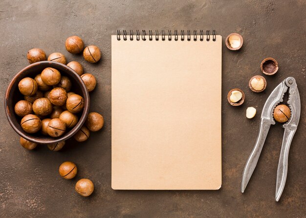 Top view roasted hazelnuts with notepad