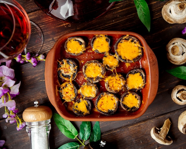 Top view of roasted mushroom stuffed with cheese