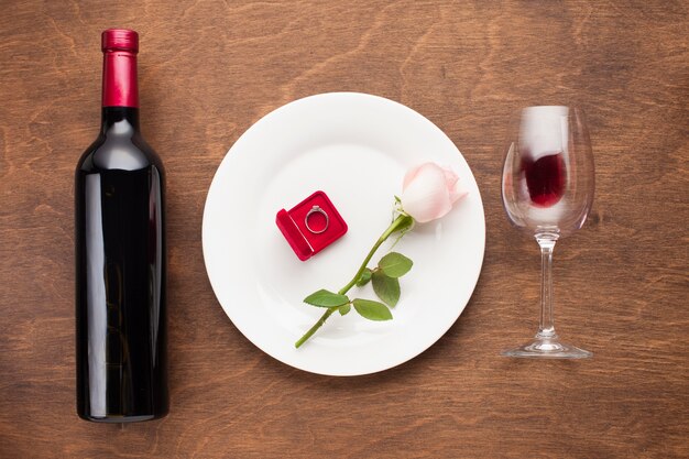 Top view romantic arrangement with wine