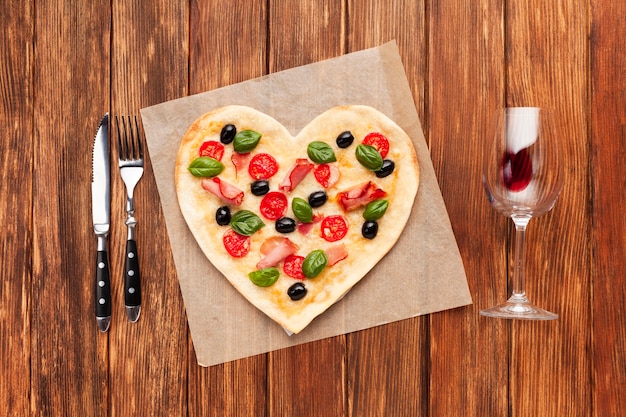 Top view romantic table setting with pizza