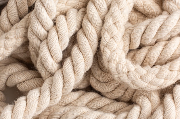 Abstract Composition, Texture Of Thick And Strong Hanging Rope Isolated On  Blurred Background, Stock Photo, Picture and Royalty Free Image. Image  146966231.