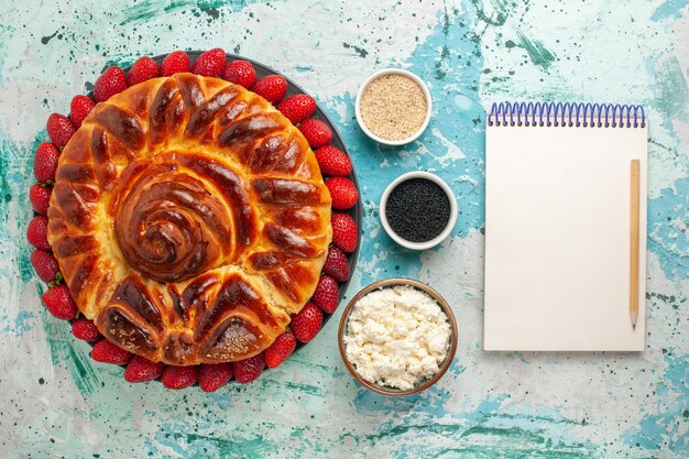 Top view round delicious pie baked and sweet cake on blue surface