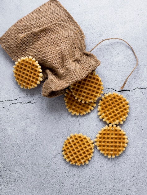 Top view of round waffles with burlap sack