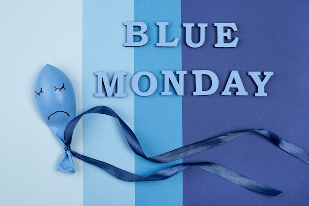 Top view of sad balloon for blue monday
