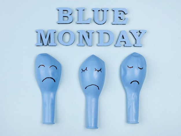 Top view of sad blue monday balloons