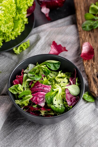 Top view salad arrangement on white cloth