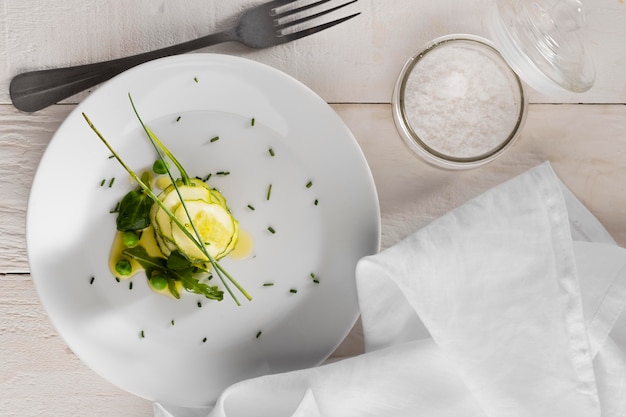 Free photo top view salad of cucumbers on a white plate