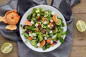 Free photo top view salad of fruit and vegetables