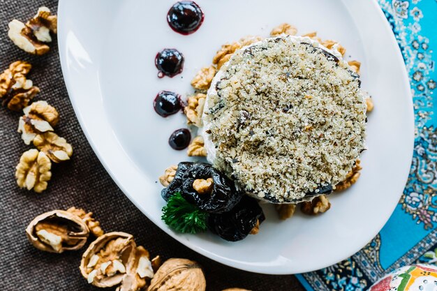 Top view salad with prunes and with walnuts