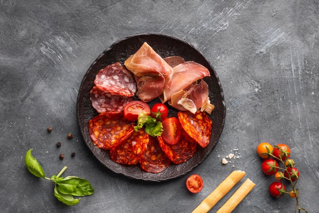 Top view of salami arrangement on plate