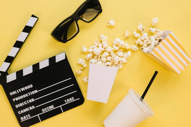 Top view salted popcorn boxes with clapperboard