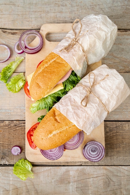 Top view sandwiches on cutting board