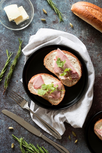 Top view sandwiches with butter and ham