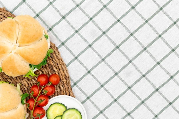 Free photo top view of sandwiches with tomatoes and copy space