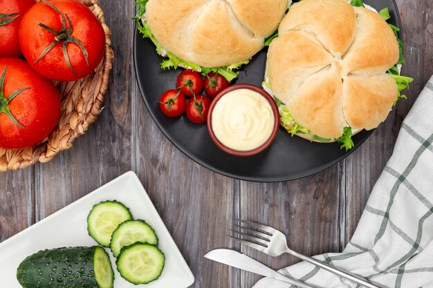 Top view of sandwiches with tomatoes and mayo