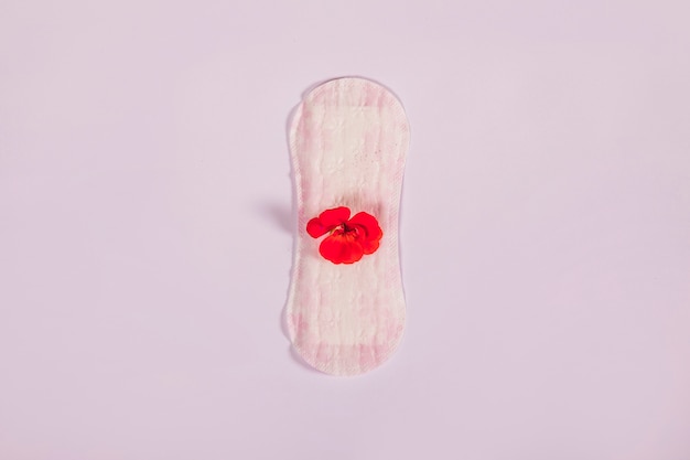 Top view sanitary towel with flower