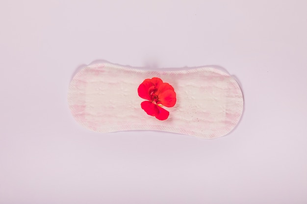 Top view sanitary towel with flower