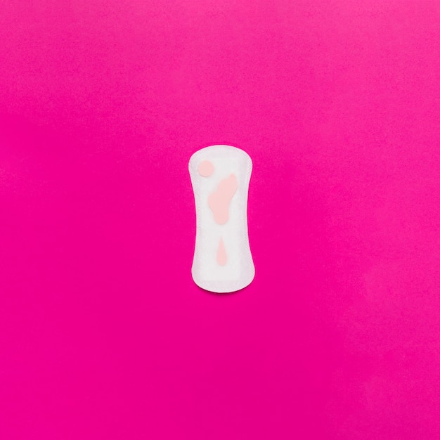 Top view sanitary towel with pink paper