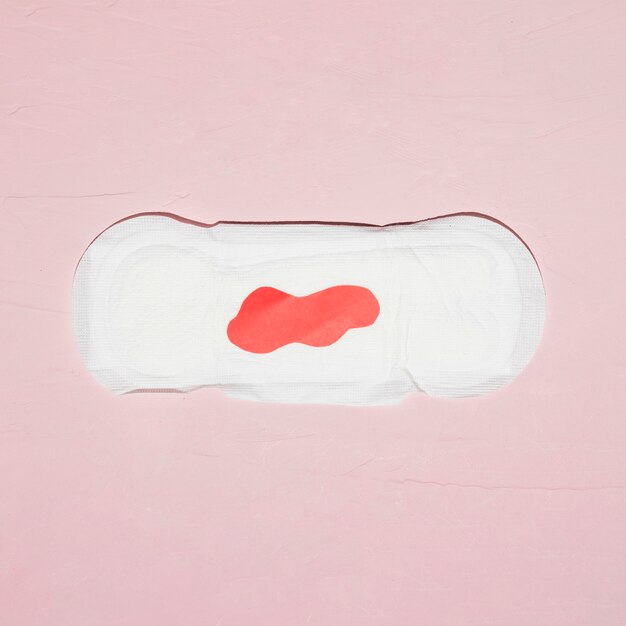 Top view sanitary towel with red paper