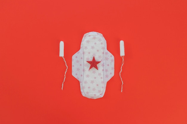 Top view sanitary towel with star and tampons