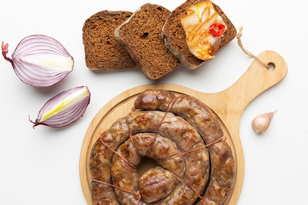 Top view sausages and bread arrangement