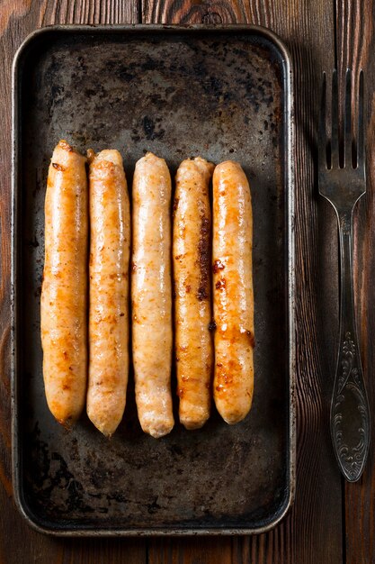 Top view sausages on tray