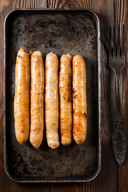 Top view sausages on tray