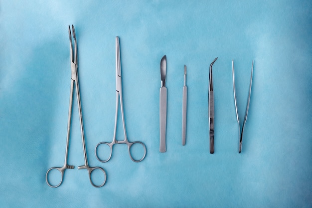 Top view of scalpel with other medical instruments