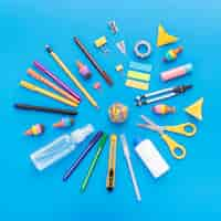 Free photo top view of school supplies with pencils and scissors