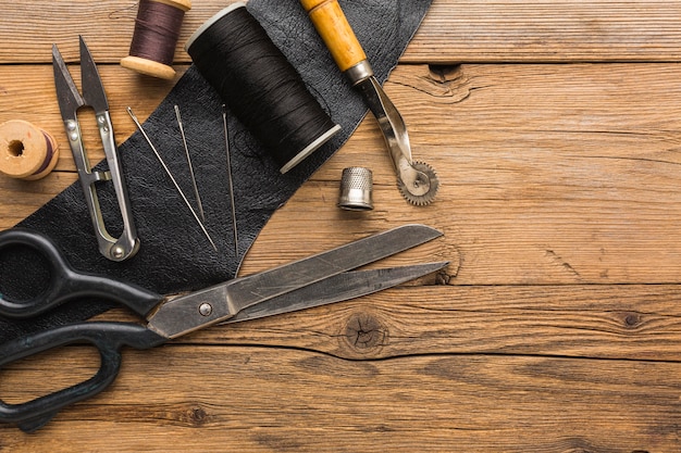 Top view of scissors with copy space and thread