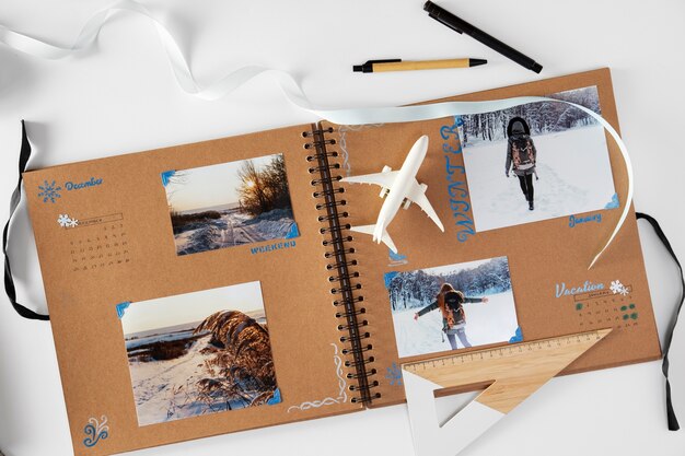 Top view scrapbook with travel pictures