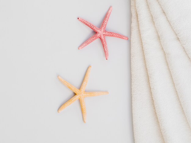 Top view seastar and towels 