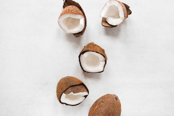 Free Photo top view selection of tasty coconuts