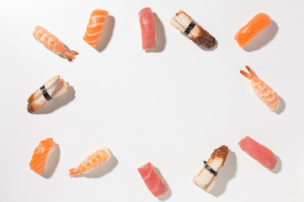 Top view selection of tasty sushi with copy space